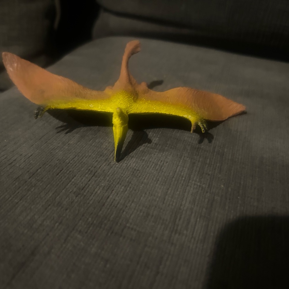 Yellow and Brown Pterodactyl Toy